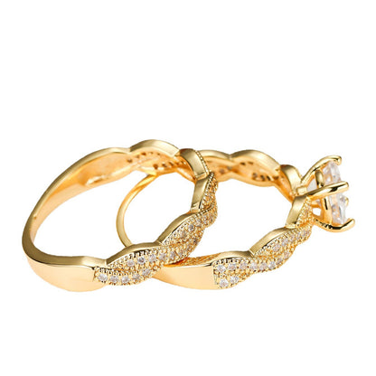 Golden Four-claw Round Cross Twist Ring