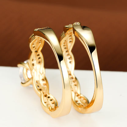 Golden Four-claw Round Cross Twist Ring